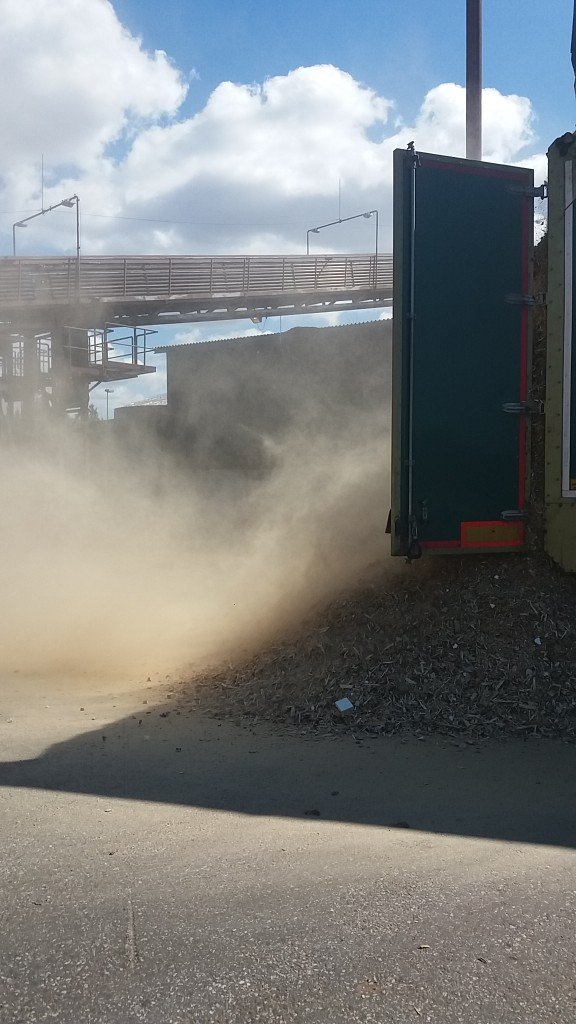dust coming from the truck during unlaoding