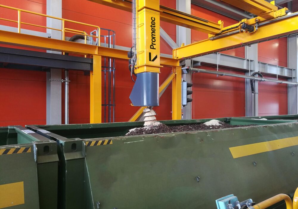 Automated train sampling system collecting a representative biomass fuel sample from a railcar for quality control and analysis.