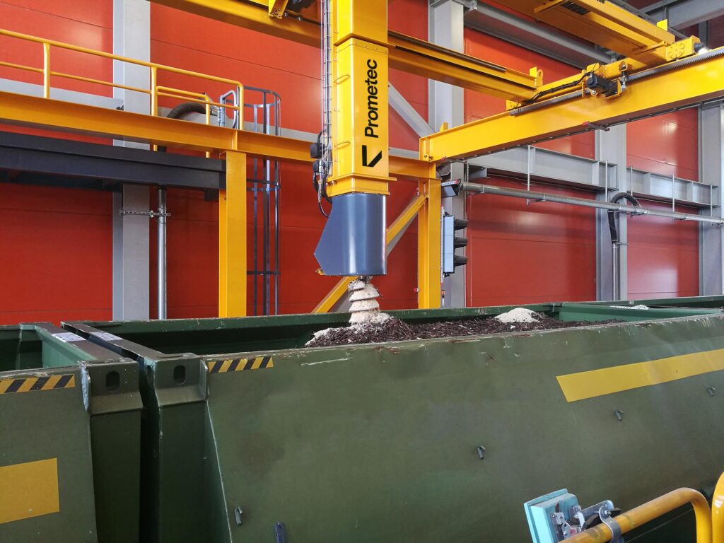 Automated train sampling system collecting a representative biomass fuel sample from a railcar for quality control and analysis.