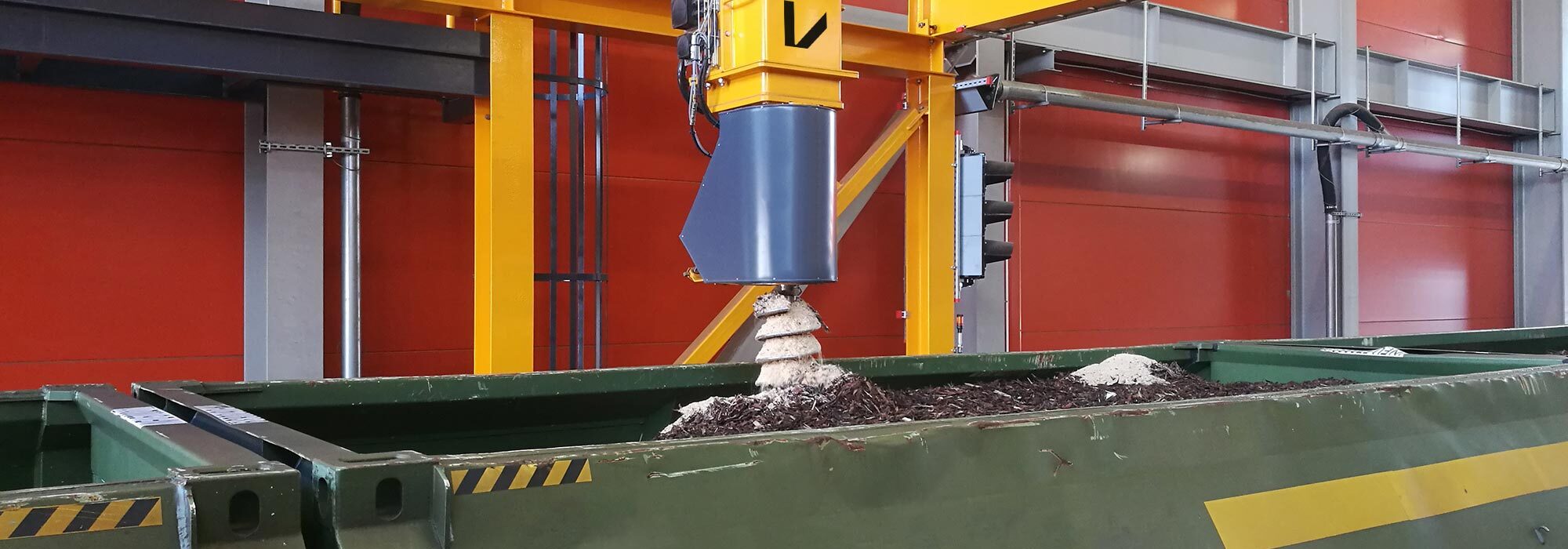 Automated train sampling system collecting a representative biomass fuel sample from a railcar for quality control and analysis.