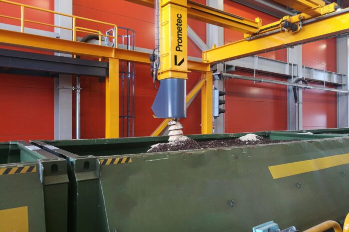 Automated train sampling system collecting a representative biomass fuel sample from a railcar for quality control and analysis.