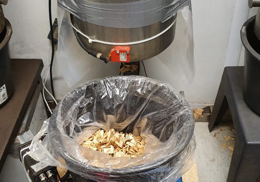 Testing device during piloting phase to measure the moisture from the wood chips