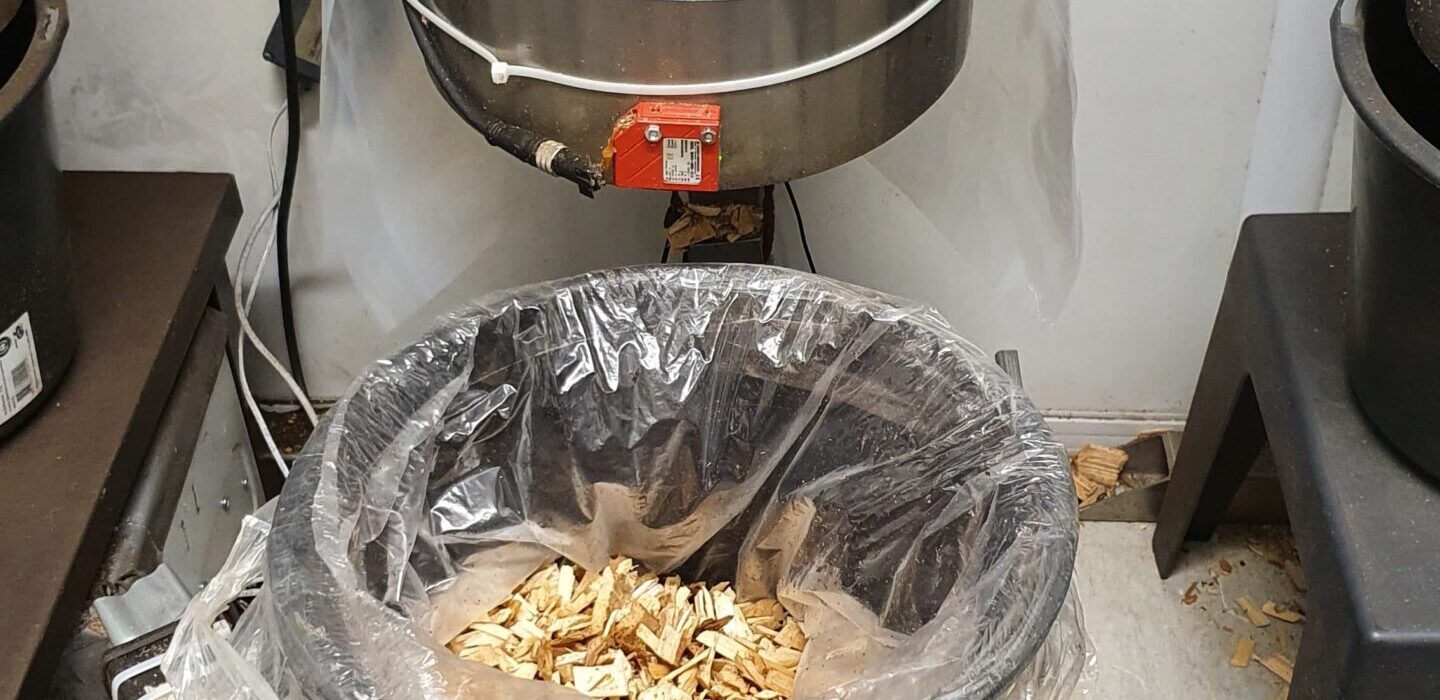 Testing device during piloting phase to measure the moisture from the wood chips
