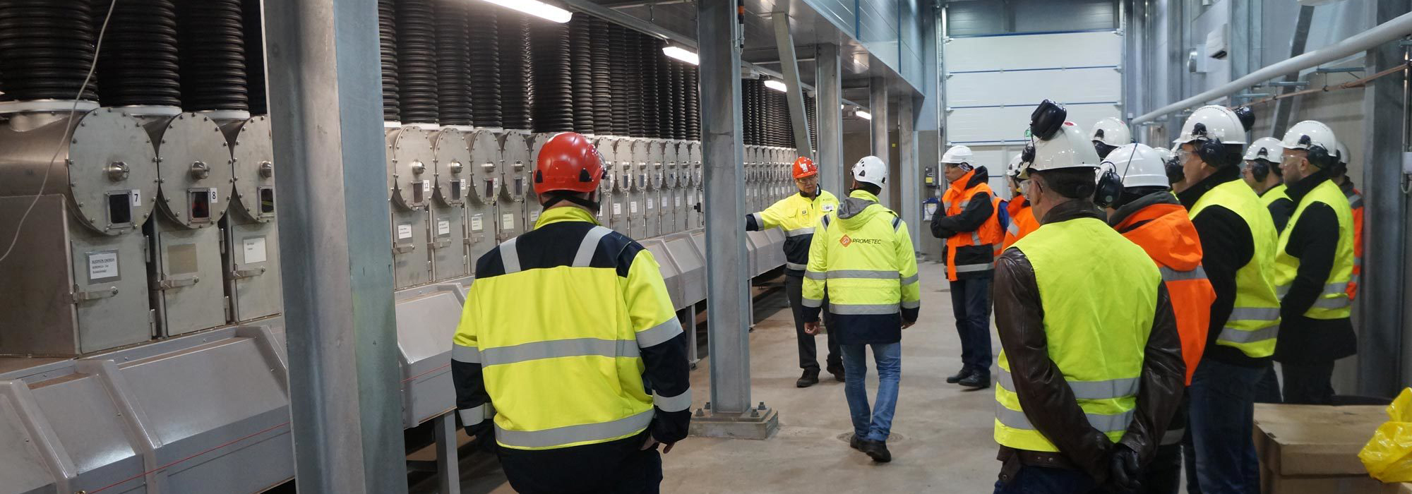 Customers participating in a reference site visit to learn about automated biomass fuel sampling and sample handling solutions.